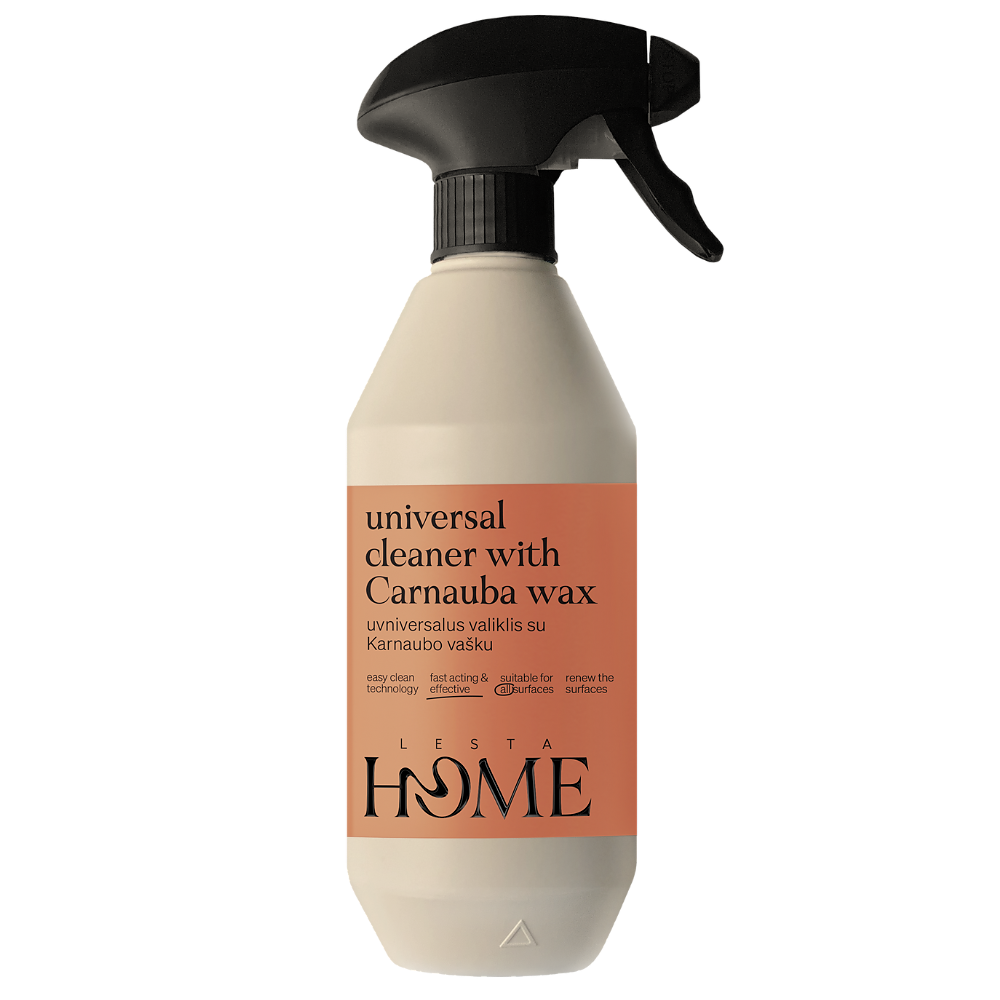 Spray bottle with beige body and black nozzle on a white background