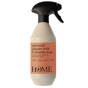 Spray bottle with beige body and black nozzle on a white background